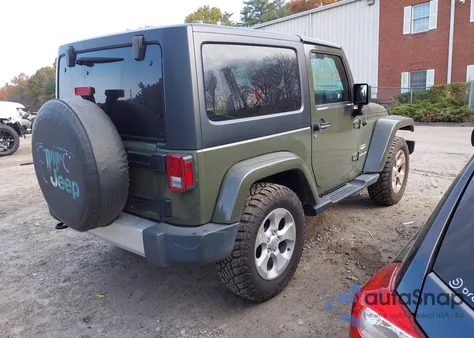2015 Jeep Wrangler Sahara z USA, uszkodzony, nr VIN 1C4AJWBG6FL694473
